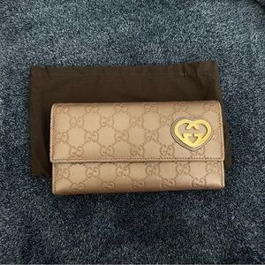 GUCCI Pink Guccissima Long Wallet with Gold Interlocking Heart Accent